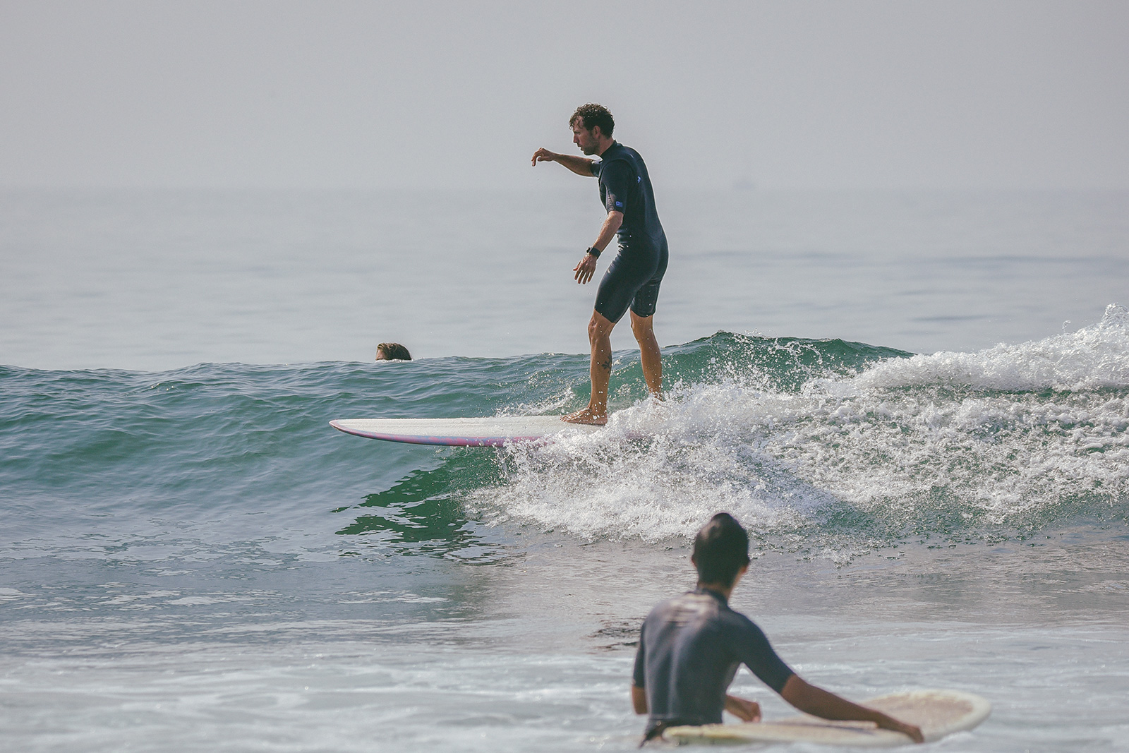 Brian Behrens catching a wave at Topanga Beach in Southern California